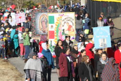 Despite temperatures in the upper 20s, over one thousand people showed their devotion to Our Lady of Guadalupe when they came out for the procession to kickoff the festival at Heritage Point Park in Dalton. Photo By Michael Alexander
